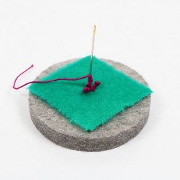 Assists in stabilizing your needle while creating various wrapped stitches.