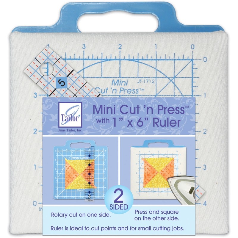 Two sided pressing and rotary cutting mat with 1" x 6" ruler.